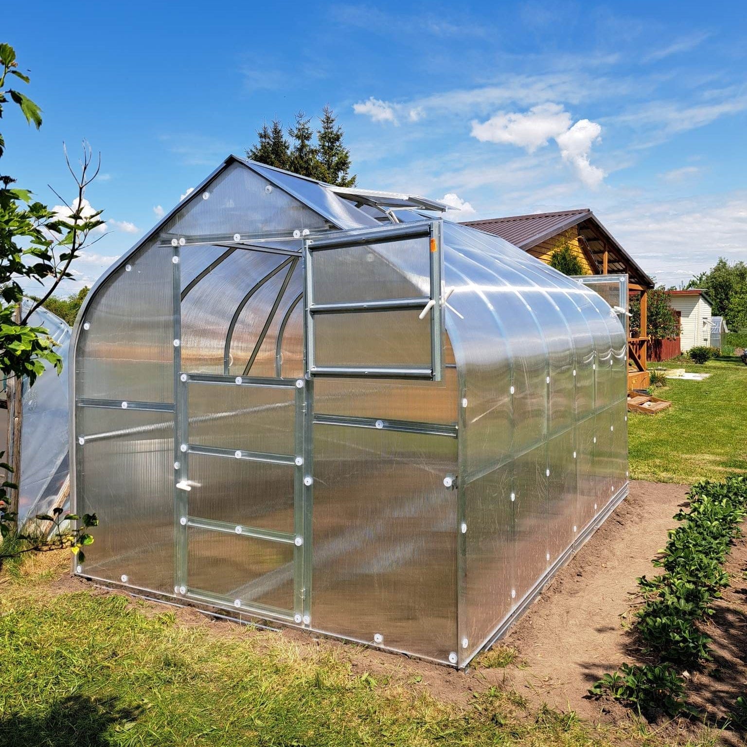 Serre de jardin polycarbonate contemporaine